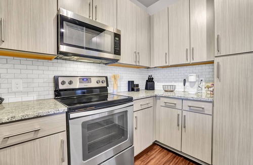 Loring Heights Apartment | Ebony Ivory Midtown King Bed