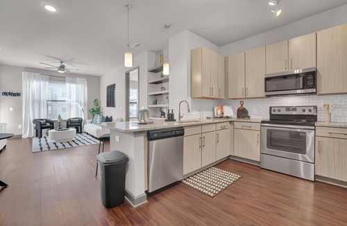 Loring Heights Apartment | Ebony Ivory Midtown King Bed