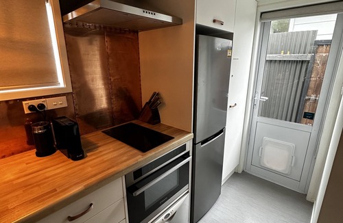 Palmerston North Apartment | Eclectic Escape - Romantic Outdoor Bath