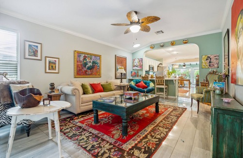 Kyle House | Eclectic Oasis: Artful & Colorful Comfort