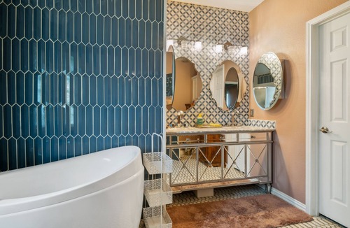 Kyle House | Eclectic Oasis: Artful & Colorful Comfort
