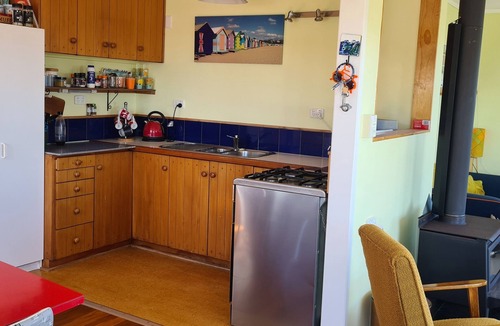 Waitarere Beach Cottage | Eclectic real kiwiana bach