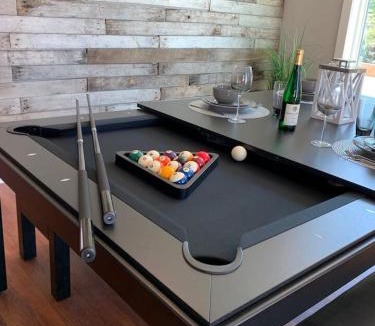 Geneva House | Eclipse Hot tub and billiards in Downtown Geneva