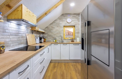 Gospic House | Eco-friendly mountain retreat with pool, jacuzzi, sauna, and panoramic Velebit views.