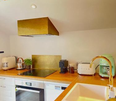 Vejlby Risskov Apartment | Eksklusiv taglejlighed med hav- og skovudsigt