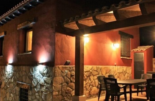 Una Cottage | El Escalerón II House | Monteagudillo Accommodation. Patio, barbecue and fireplace