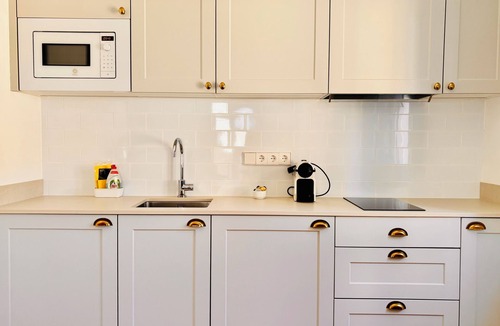 Ullastret Apartment | EL FORT DúLLASTRET. Apartment 4. Double room, sofa bed and balcony.