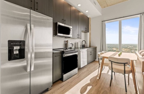 Channel District Apartment | Elegant 1BR Walkable to Dining, Pool + Gym