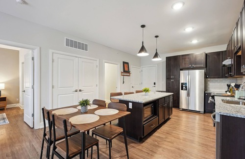 Italian Village Apartment | Elegant 2BD/2BA condo w Parking/Pool/Gym