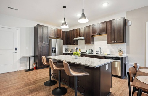 Italian Village Apartment | Elegant 2BD/2BA condo w Parking/Pool/Gym
