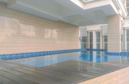Jakarta Apartment | Elegant and Comfy Studio Loft Apple 1 Condovilla Apartment By Travelio
