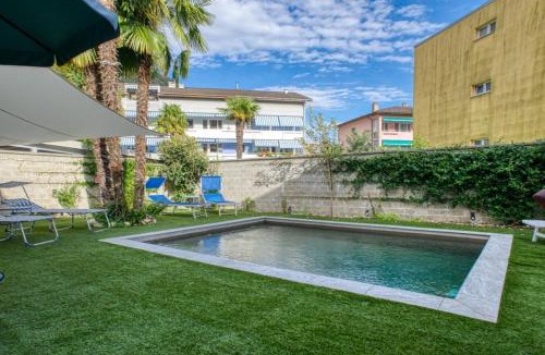 Arcegno Apartment | Elegant apartment with pool and parking