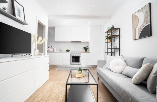 Playa Flamenca Apartment | Elegant Boutique Flat with Panoramic Rooftop Views