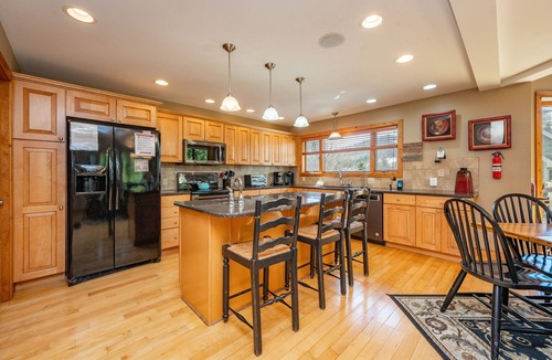 McHenry House | Elegant Chalet w/Wisp Views, Dock & Hot Tub