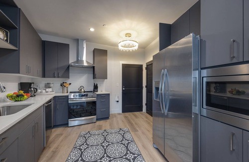 West End Condo | Elegant Corner Penthouse with Private Balcony, Skyline Views, Pool, and Gym