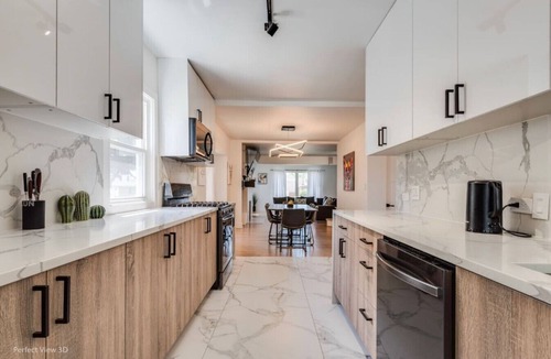 Elmhurst Apartment | Elegant Haven: 4BR/3BA Retreat