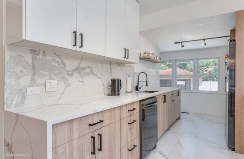 Elmhurst Apartment | Elegant Haven: 4BR/3BA Retreat