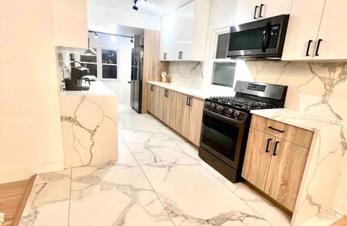 Elmhurst Apartment | Elegant Haven: 4BR/3BA Retreat