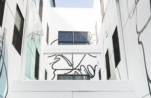 Buckman Neighborhood Apartment | Elegant King Stay at Hotel Grand Stark | Pet-Friendly, Near Portland Rock Gym