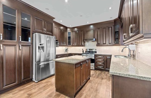 Hurontario House | Elegant Living with Fireplaces and Backyard BBQ