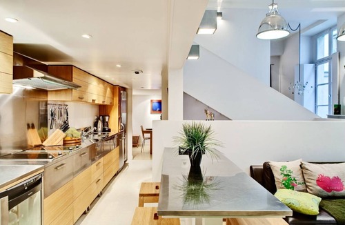 Saint-Gervais Apartment | Elegant Loft inHistoric Parisian Mansion with Courtyard Charm and Artistic Flair