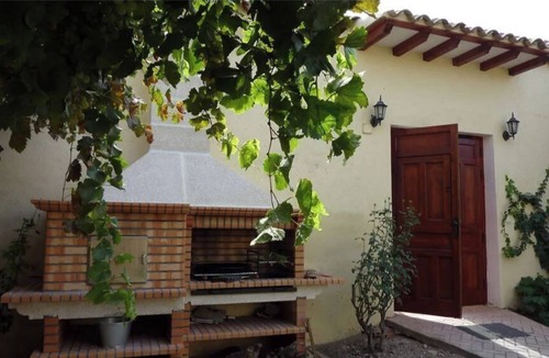 Pozo-Lorente Cottage | Elegant Manor House near Alcalá del Jucar with Piano.