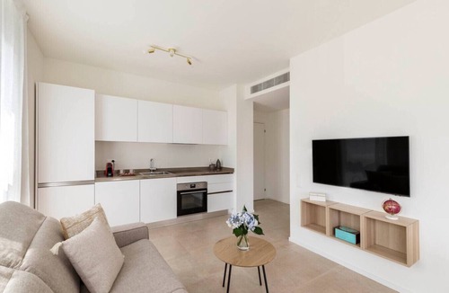 Lugano Apartment | Elegant new Apt with AC, private balcony & garage