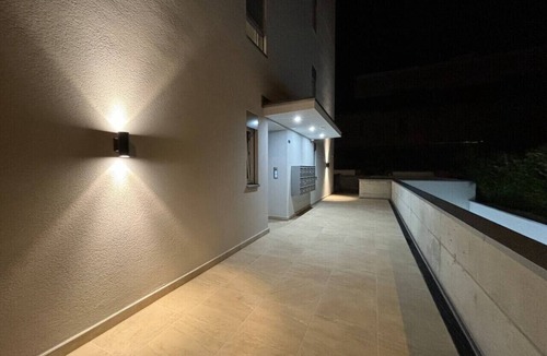 Lugano Apartment | Elegant new Apt with AC, private balcony & garage