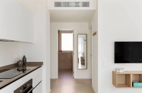 Lugano Apartment | Elegant new Apt with AC, private balcony & garage
