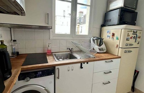 Levallois-Perret Apartment | Elegant Retreat in Levallois with Sunny Balcony