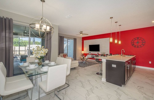 Kissimmee Ski Chalet | Elegant Townhouse 4Beds/3Baths/Pool/18 Min Disney