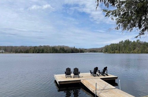 Highlands East Cottage | Elegant waterfront retreat on Paudash Lake with sunset views!