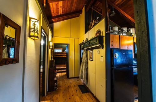 Sundance Cabin | Elevated creekside escape Set in the trees Hot tub Private setting Above Sundance Canyon