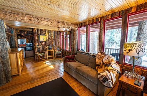 Sundance Cabin | Elevated creekside escape Set in the trees Hot tub Private setting Above Sundance Canyon