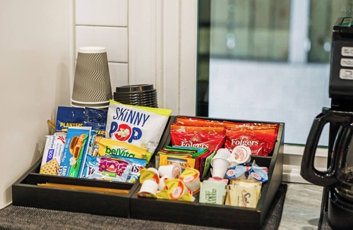 Raleigh House | Elevated Escape: Made to Gather. Spa. Game Lounge