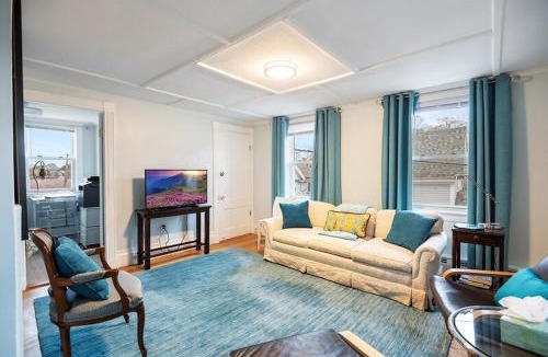 Gloucester Apartment | Elevated Fish & Ships on River Walk to Beach Park