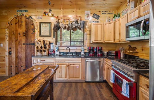 Sevierville Cabin | Elevator! Indoor Pool, 2 Arcades, Outdoor Kitchen and Firepit 8per Hot Tub