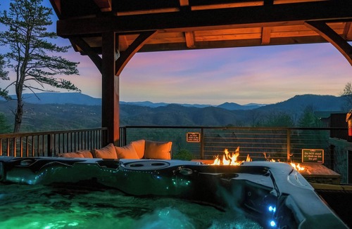 Sevierville Cabin | Elevator! Indoor Pool, 2 Arcades, Outdoor Kitchen and Firepit 8per Hot Tub