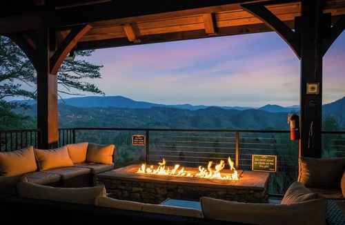 Sevierville Cabin | Elevator! Indoor Pool, 2 Arcades, Outdoor Kitchen and Firepit 8per Hot Tub