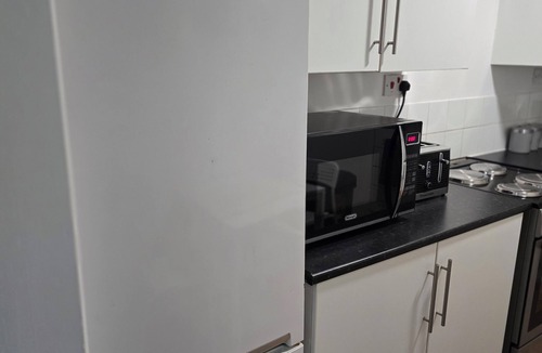 Custom House House | Emerald Apartment With Triple A Star Proximity