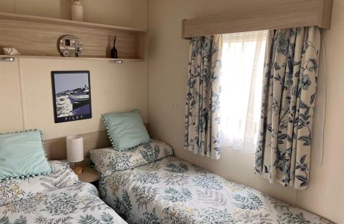 Muston Other | Emerald Escape, Filey