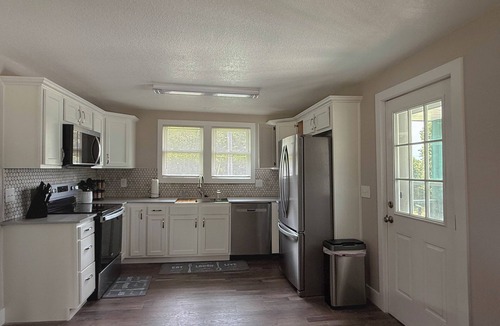 St. Robert House | Emerald & Ivory Cottage