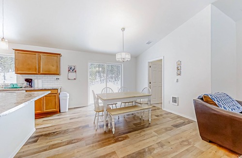 Crescent House | Enchanting 10-acre retreat with waterfront views & spacious deck