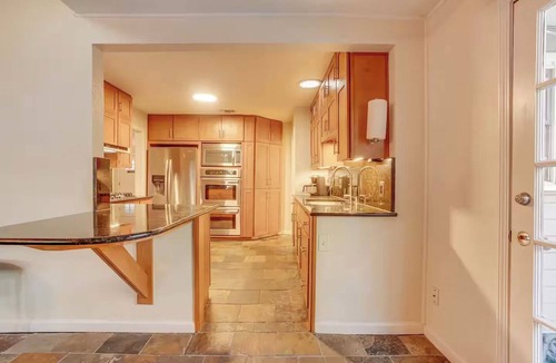 Terrell Heights House | Enchanting 4-bedroom house with Pool, Theater, Firepit and Games. Pet Friendly.