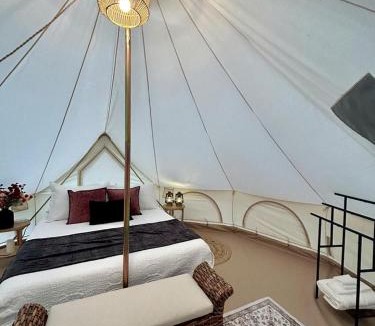 Gentry House | Enchanting Mountain Glamping Tents with Elevated Decks and Fire Pit Near Gentry, AR