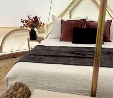 Gentry House | Enchanting Mountain Glamping Tents with Elevated Decks and Fire Pit Near Gentry, AR