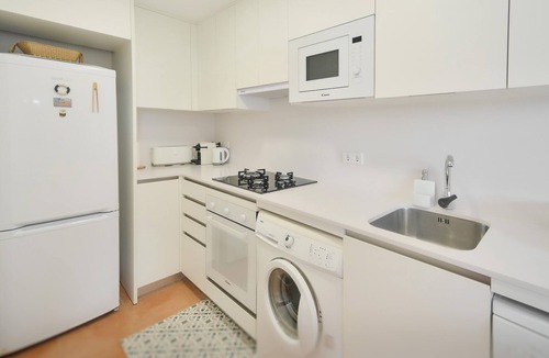 Platja d'Aro Apartment | Enjoy a Comfortable and Relaxing Stay in This Bright Apartment with Private Garden