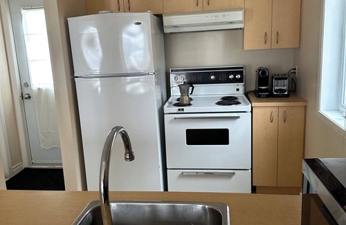 Bromont Condo | Enjoy a nice ski in ski out vacation in this cozy condo with fireplace.