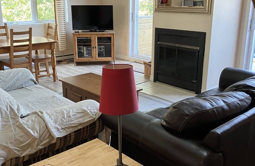 Bromont Condo | Enjoy a nice ski in ski out vacation in this cozy condo with fireplace.