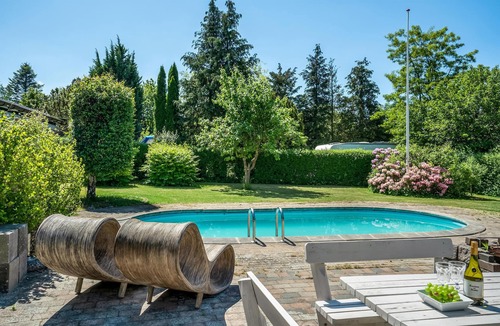 Kirke Hyllinge House | Enjoy a relaxing vacation in this attractive vacation home with outdoor pool.